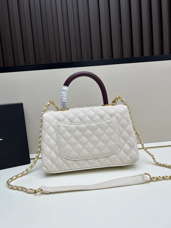 Chanel Coco Handle Ngưu vàng đen