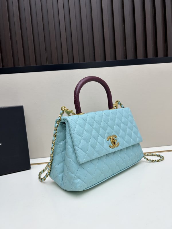 Chanel Coco Handle Ngưu vàng đen