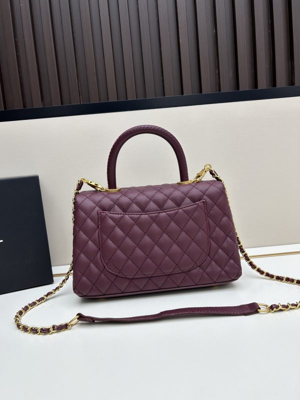 Chanel Coco Handle Ngưu vàng đen