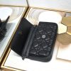 This Lady Dior mobile phone bag is elegant in style.