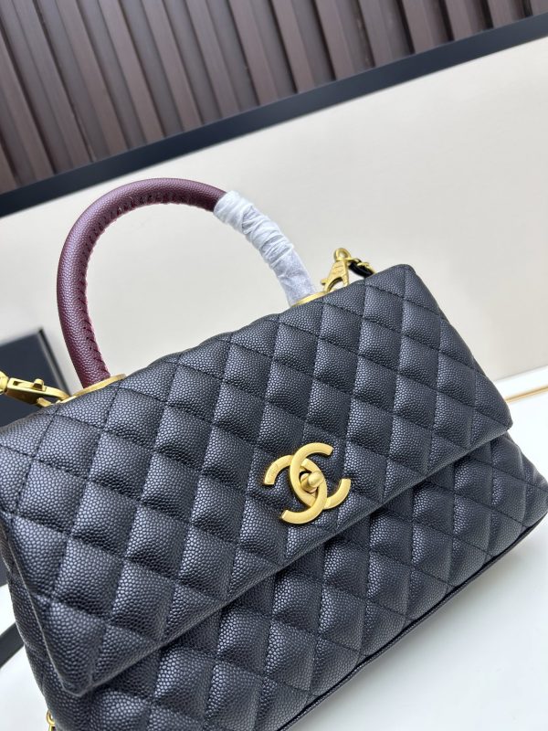 Chanel Coco Handle Ngưu vàng đen
