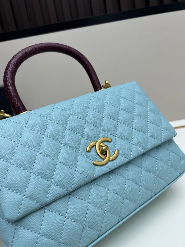Chanel Coco Handle Ngưu vàng đen