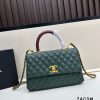 Chanel Coco Handle Ngưu vàng đen