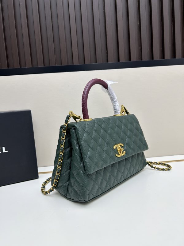 Chanel Coco Handle Ngưu vàng đen