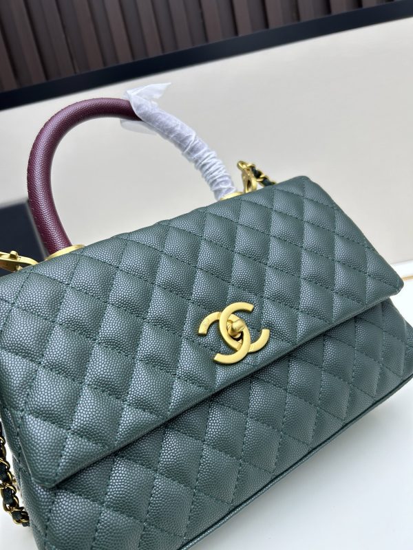 Chanel Coco Handle Ngưu vàng đen