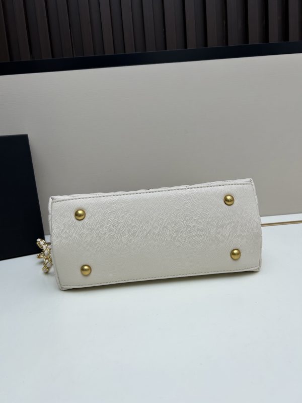 Chanel Coco Handle Ngưu vàng đen