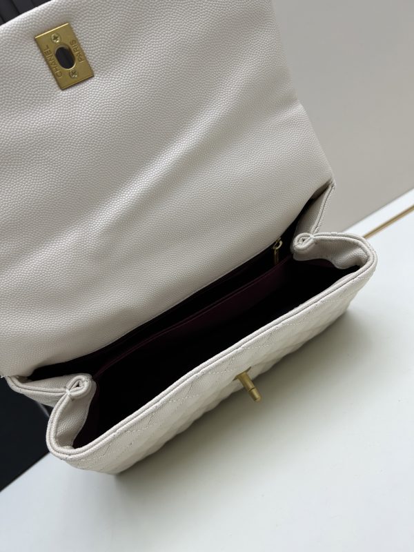 Chanel Coco Handle Ngưu vàng đen