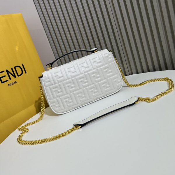 BAGUETTE handbag, delicate cowhide 3D relief double F.