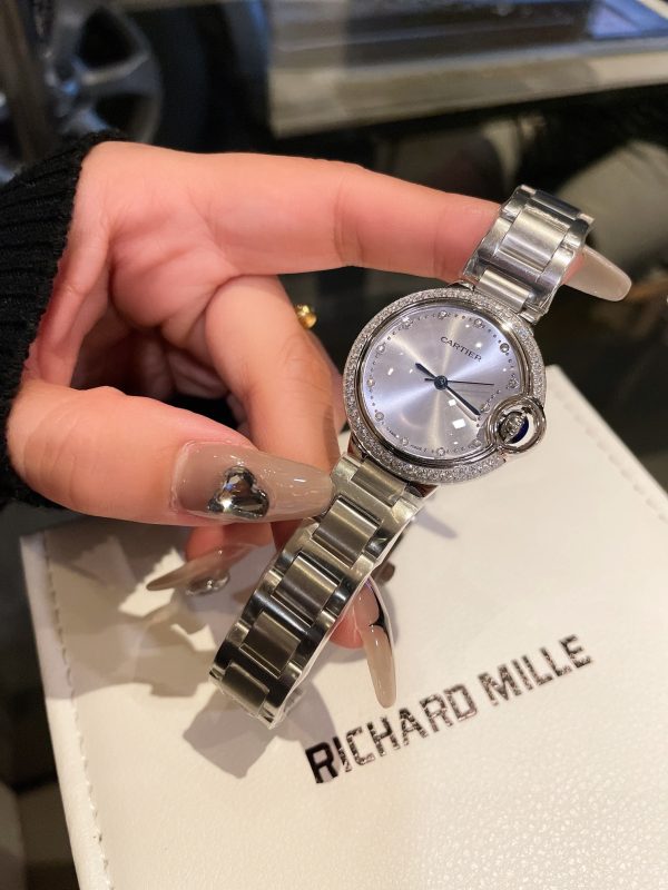 đồng hồ cartier xanh 33mm thạch anh