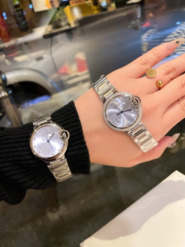 đồng hồ cartier xanh 33mm thạch anh